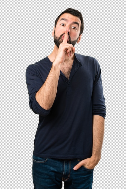 Bell&#39;uomo con la barba che fa gesto di silenzio