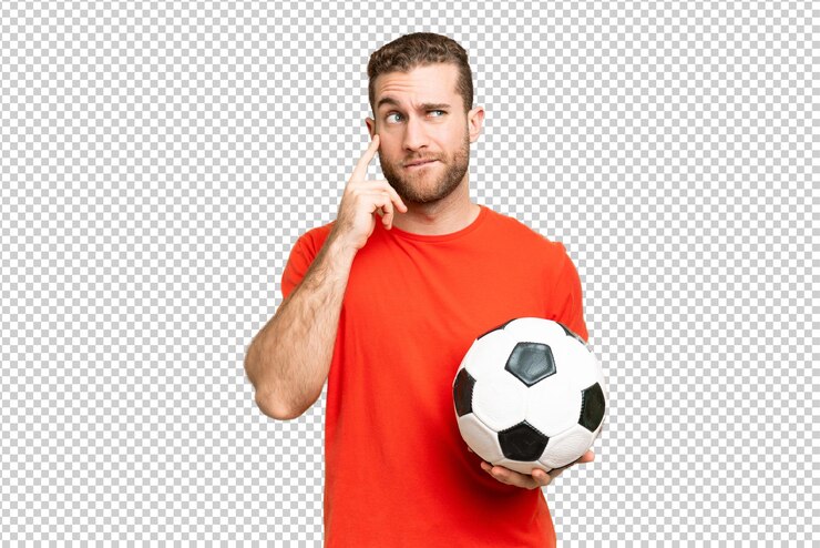 PSD bellissimo giovane giocatore di calcio uomo sopra isolato chroma chiave sfondo avendo dubbi e pensare