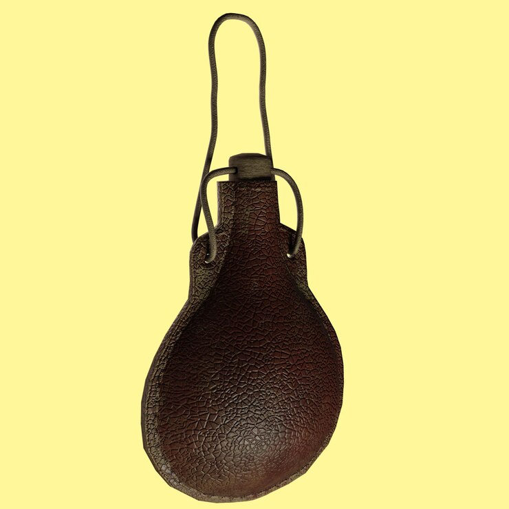 PSD una bolsa de cuero marrón con un mango que dice un en él