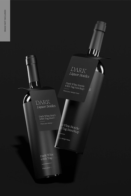 Botellas de vino oscuro con maqueta de etiqueta, cayendo