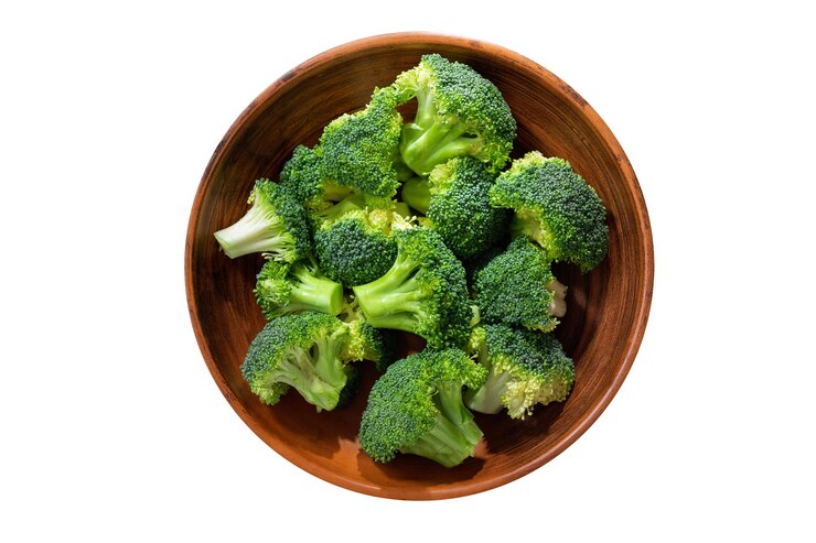 PSD bowl of fresh broccoli florets isolated on transparent background top view