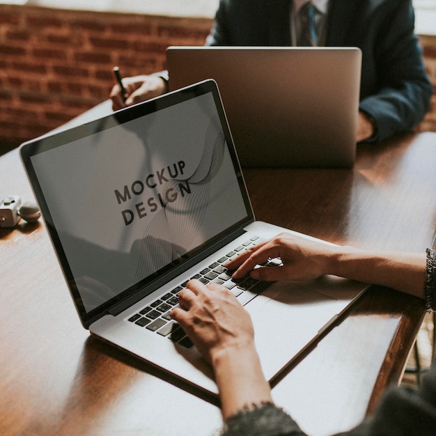 businesswoman using a laptop screen mockup