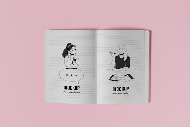 Caderno com vista superior em fundo rosa