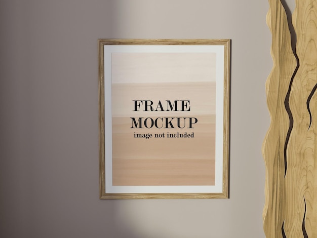 Cadre d'affiche en bois maquette sur le mur