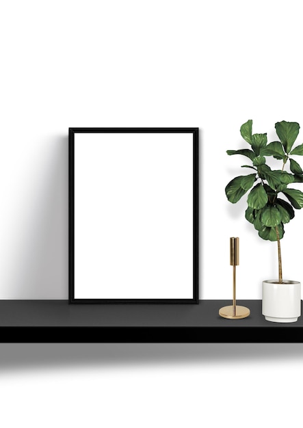 un cadre d'image sur une étagère avec une plante dedans