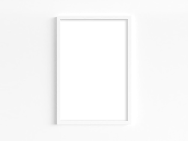 Cadre vertical blanc sur le mur blanc