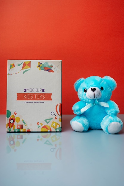 Caixa de brinquedos colorida para crianças com ursinho de pelúcia