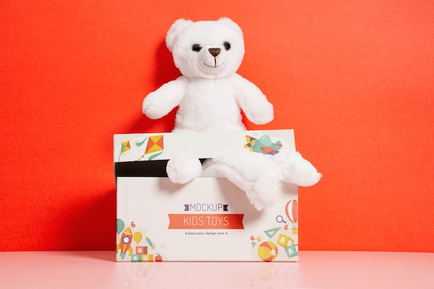 Caixa de brinquedos colorida para crianças com ursinho de pelúcia