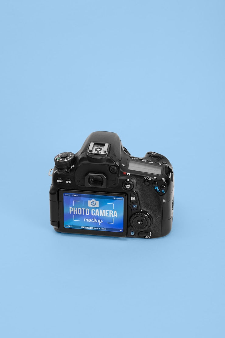 PSD cámara de fotos con maqueta de fondo azul.