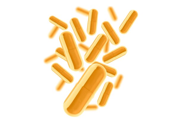 Cápsulas amarillas Muchas pastillas sobre fondo transparente aislado