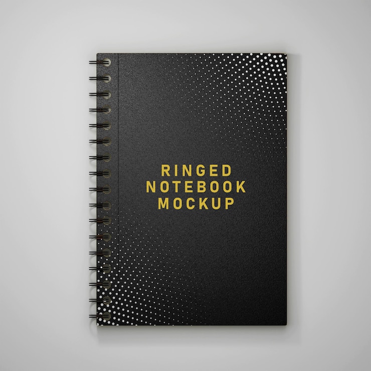 PSD un carnet de notes en spirale avec une couverture noire qui dit anneau sur elle