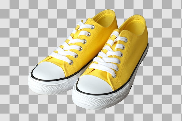 Chaussures d'été Chaussures de sport jaune vif isolées avec des lacets blancs adaptées aux vêtements décontractés et aux activités de plein air isolées sur PNG blanc