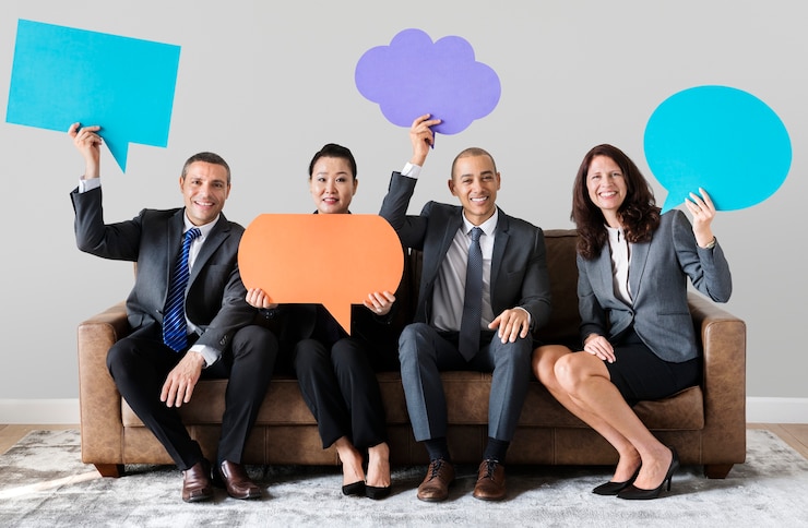 PSD cheerful business people holding speech bubble