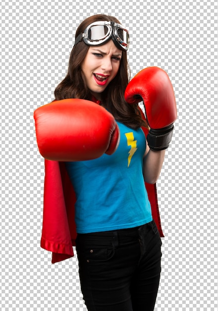 Chica bonita superhéroe con guantes de boxeo