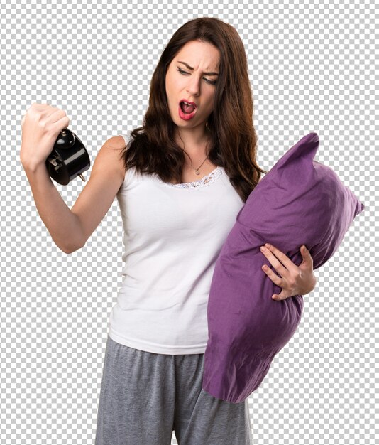 PSD chica joven hermosa con una almohada que sostiene el reloj del vintage