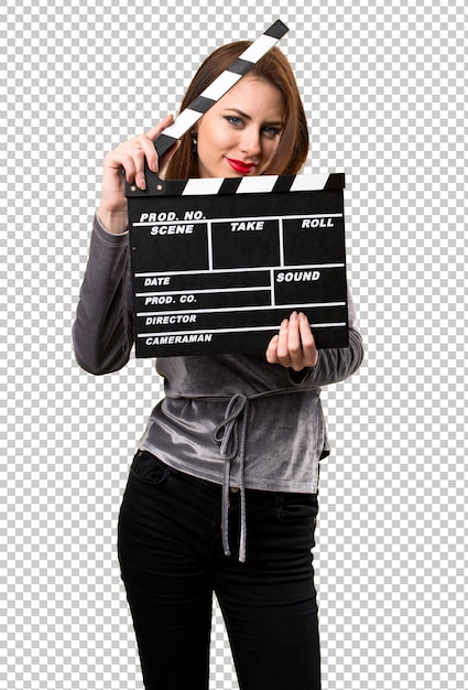 PSD chica joven hermosa que sostiene un clapperboard