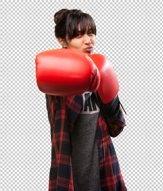 Chica latina golpeando con guantes rojos