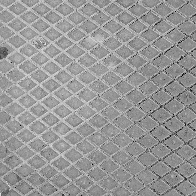 Close-up de uma superfície de placa de diamante em cinza