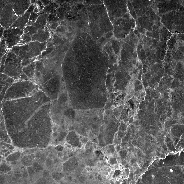 PSD close-up di una superficie di marmo grigio con vene e texture