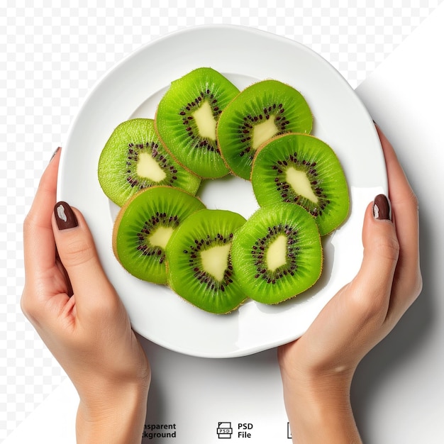 PSD closeup de prato em mãos femininas menina mulher comendo fatias de frutas tropicais kiwi isoladas em branco dieta saudável e nutrição foto de estúdio