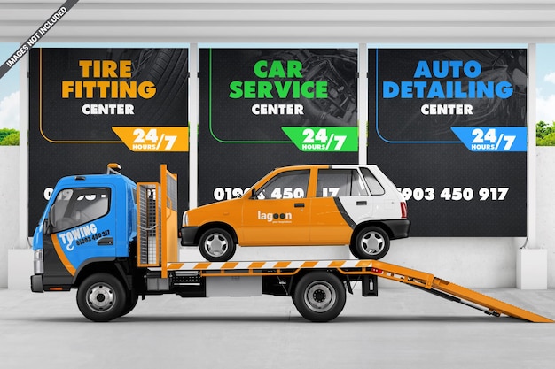 Coche en grúa cerca de la maqueta de vallas publicitarias de anuncios de servicio de coche