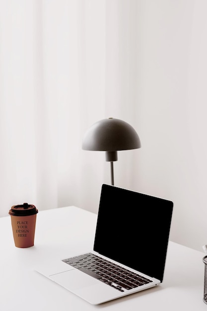 Coffee Cup Mockup PSD on Work Desk Scene
