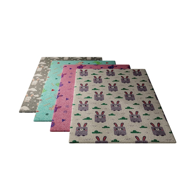 Una colección de cuatro alfombras de diferentes colores con diseños de conejos