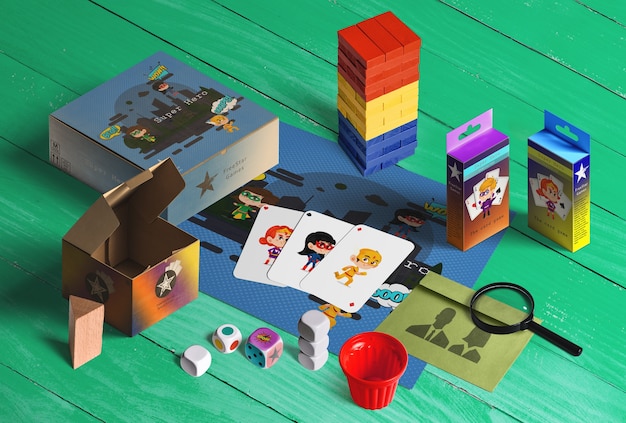 Collection de jouets pour les enfants. jenga, cartes, loupe, dés, boîte en carton