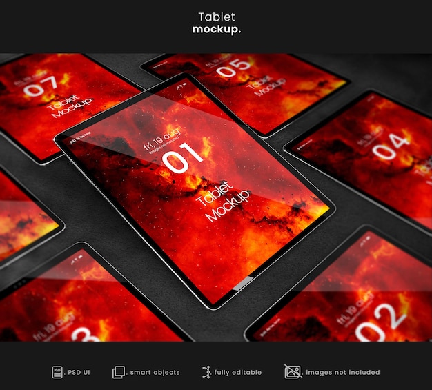 Collezione di mockup di tablet su un tavolo strutturato scuro