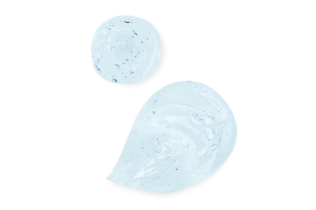 Composição de esfregaços e gotas ou gotas de um soro de gel azul transparente em um fundo transparente vazio