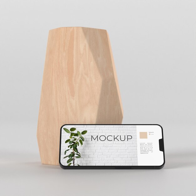 Composição elegante com maquete de smartphone e vaso