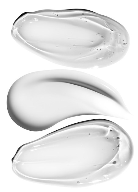 Composición de manchas blancas de crema y manchas de gel transparente en un vacío