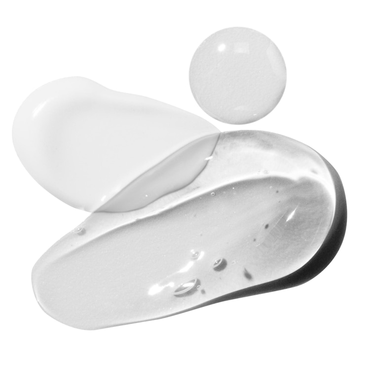 PSD composizione di smear di crema smear di gel cosmetico trasparente e gocce su uno sfondo vuoto