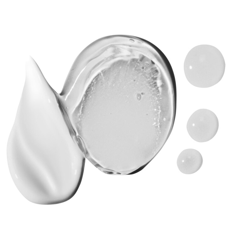 PSD composizione di smear di crema smear di gel cosmetico trasparente e gocce su uno sfondo vuoto