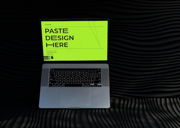 una computadora portátil con un letrero verde que dice diseño artístico aquí aquí aquí