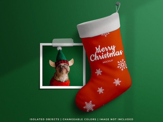 Conceito de Natal maquete de férias com cartão de porta-retratos de papel e meia isolada