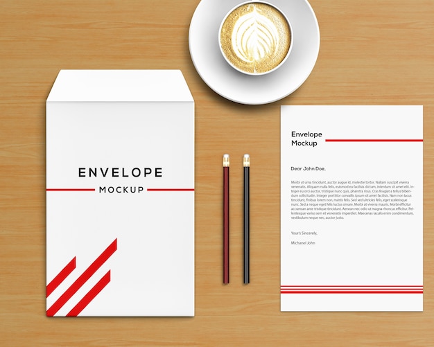 PSD concepto stationery con mockup de sobre y café