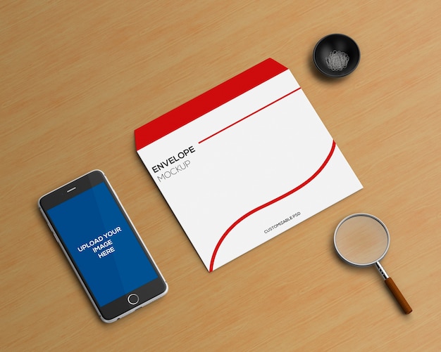 Concepto stationery con mockup de sobre y smartphone