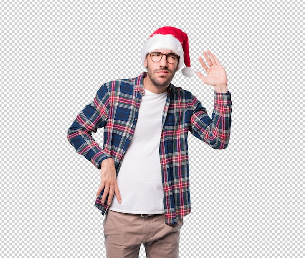 Conceptos de navidad - hombre joven gesticulando