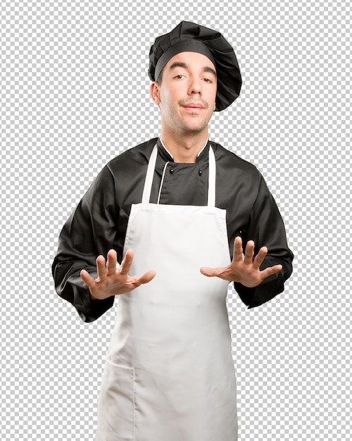 Confiado chef con un gesto de mantener la calma