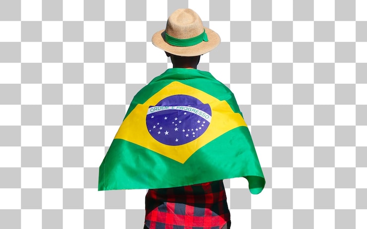 PSD contadino con cappello che tiene bandiera brasiliana per il giorno dell'indipendenza uomo nero che tiene bandiera del brasile isolata