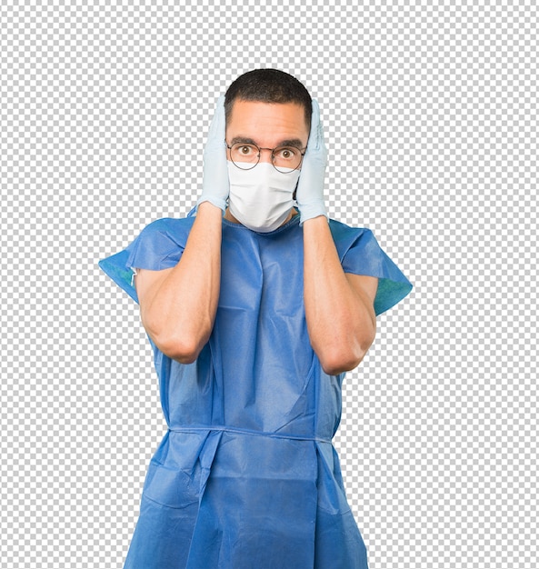 Coronavirus. Joven haciendo conceptos y con máscara y guantes protectores
