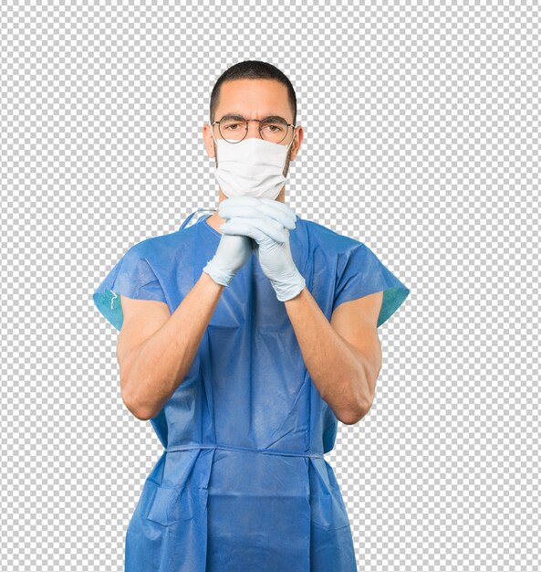 Coronavirus. Joven haciendo conceptos y con máscara y guantes protectores