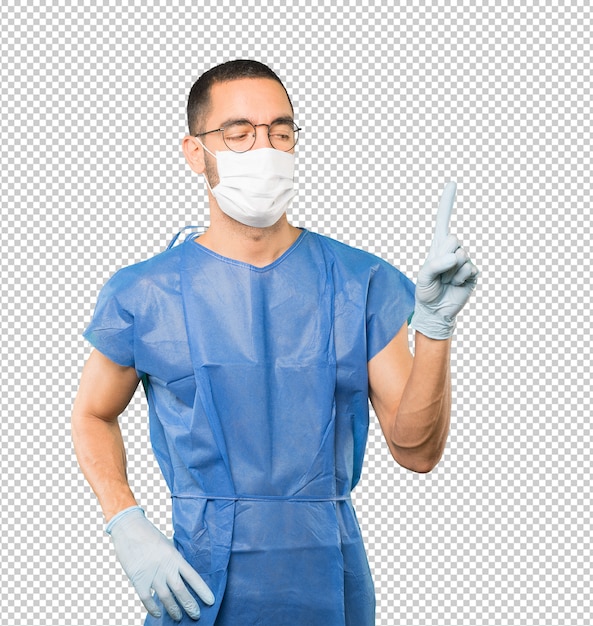 Coronavirus. Joven haciendo conceptos y con máscara y guantes protectores