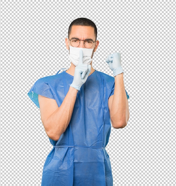 Coronavirus. Joven haciendo conceptos y con máscara y guantes protectores