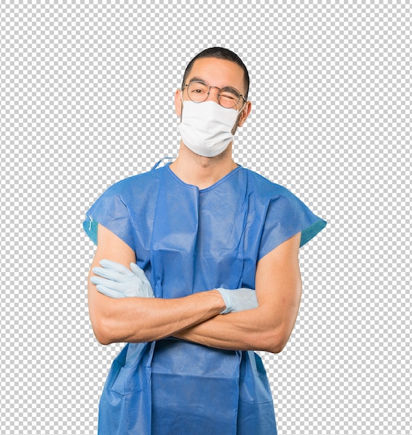 Coronavirus. Junger Mann, der Konzepte tut und Maske und Schutzhandschuhe trägt