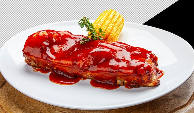 Costolette di maiale arrosto con salsa barbecue e mais verde