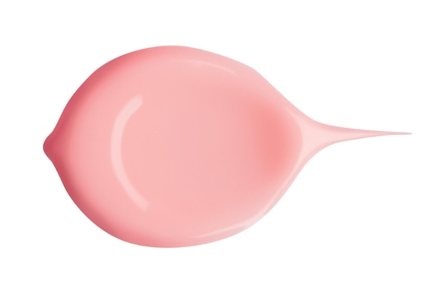 Une couche de crème rose sur un fond vide
