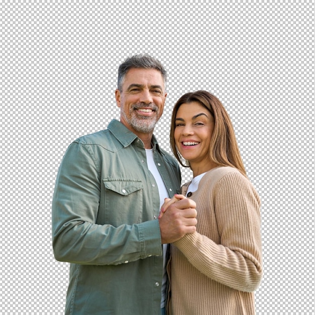 Un couple heureux se tenant par la main et souriant