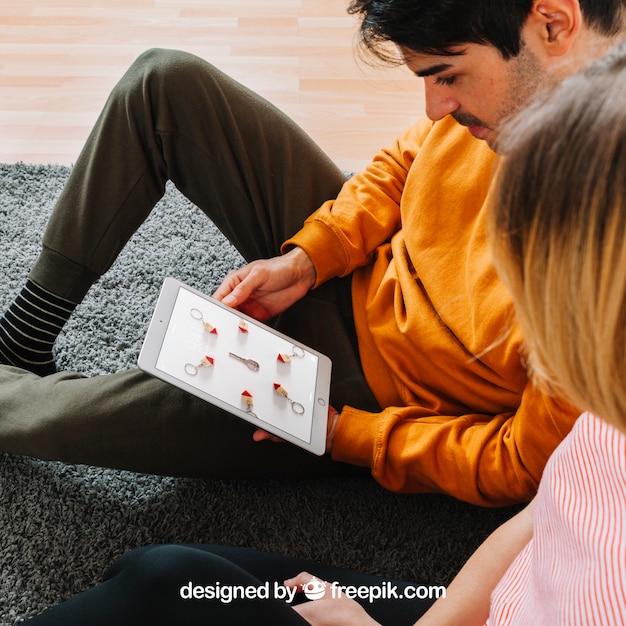 Couple looking at tablet